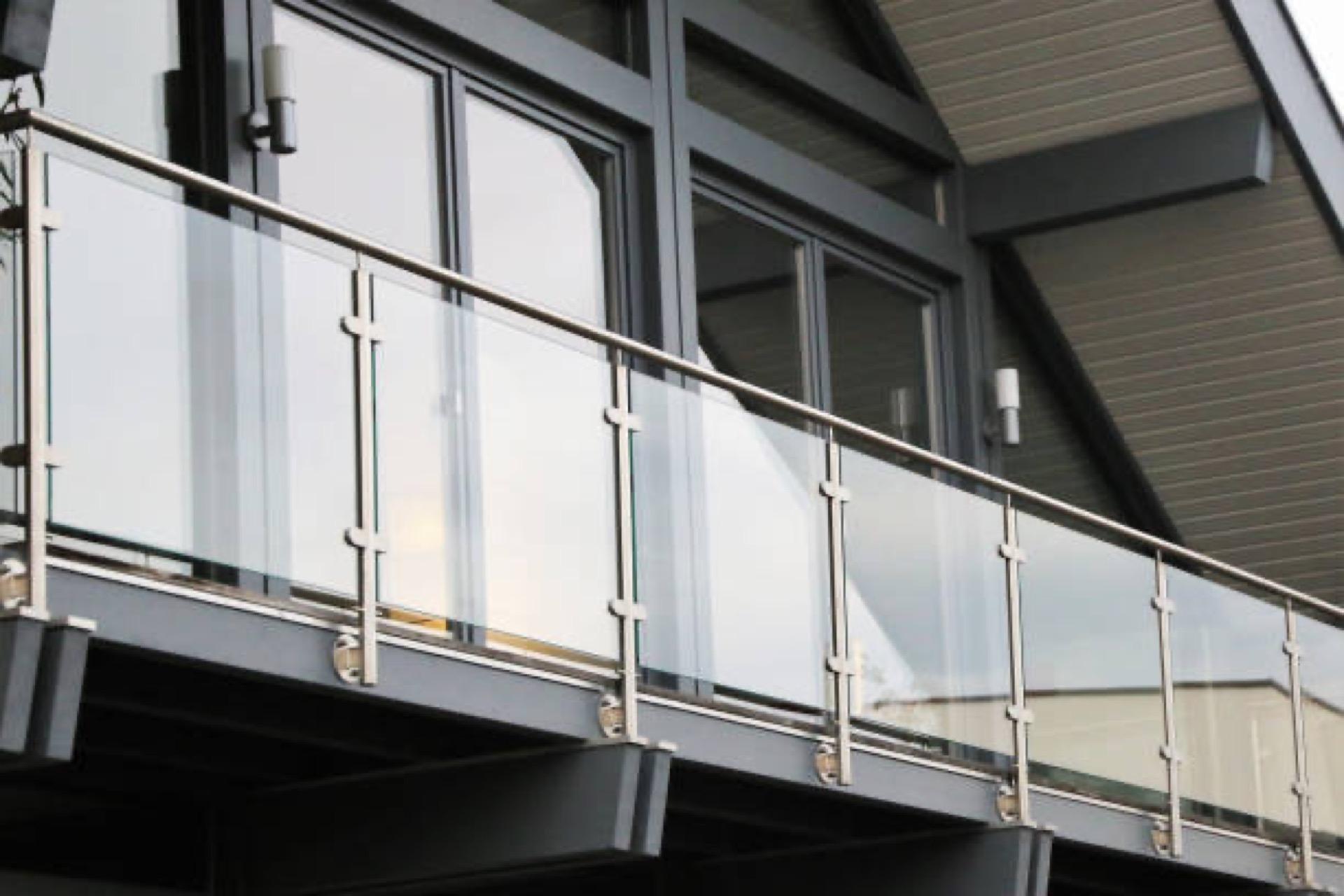 Channel glass railings installed on a balcony